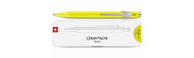 Bolígrafo Caran d'Ache 849 POPLINE amarillo fluorescente con soporte